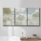 Three-panel canvas wall art featuring whimsical vertical tree landscape, displayed in a bathroom above a bathtub.
