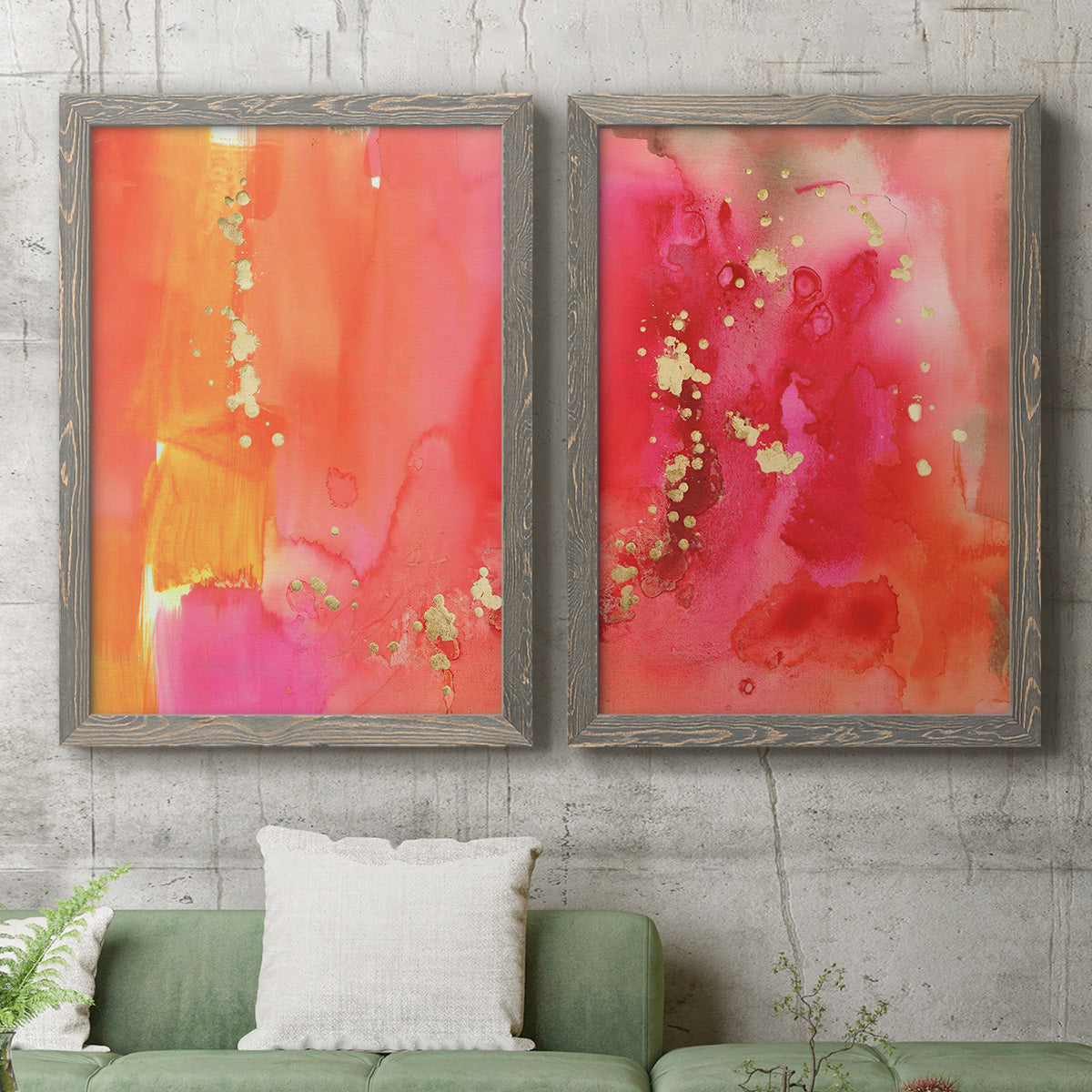 Set of two gray barnwood framed canvas prints depicting a coordinated art pair of luminous coral orange and pink color fields with gold flecks rendered as glamorous fluid abstracts above a sofa in a modern living room.