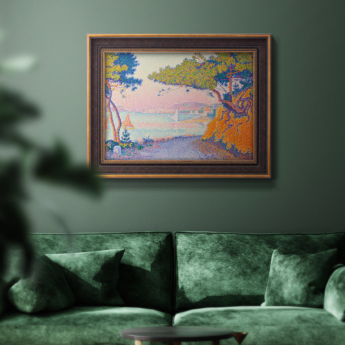 Pointillist coastal seascape by Paul Signac in an ornate bronzed mahogany wood frame displayed in a dark-toned interior setting.