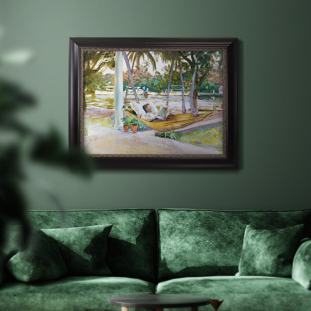 Impressionist leisure portrait scene by John Singer Sargent in an ornate black frame with gilded inner detail displayed in a dark-toned interior setting.