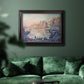 Impressionist Mediterranean harbor painting by Paul Signac in an ornate black frame with gilded inner detail displayed in a dark-toned interior setting.