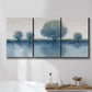 Three-panel canvas wall art featuring calm afternoon river reflection, displayed in a bathroom above a bathtub.