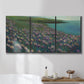 Three-panel canvas wall art featuring calm coastal landscape sanctuary, displayed in a bathroom above a bathtub.