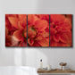Three-panel canvas wall art featuring vivid red floral close up, displayed in a bathroom above a bathtub.