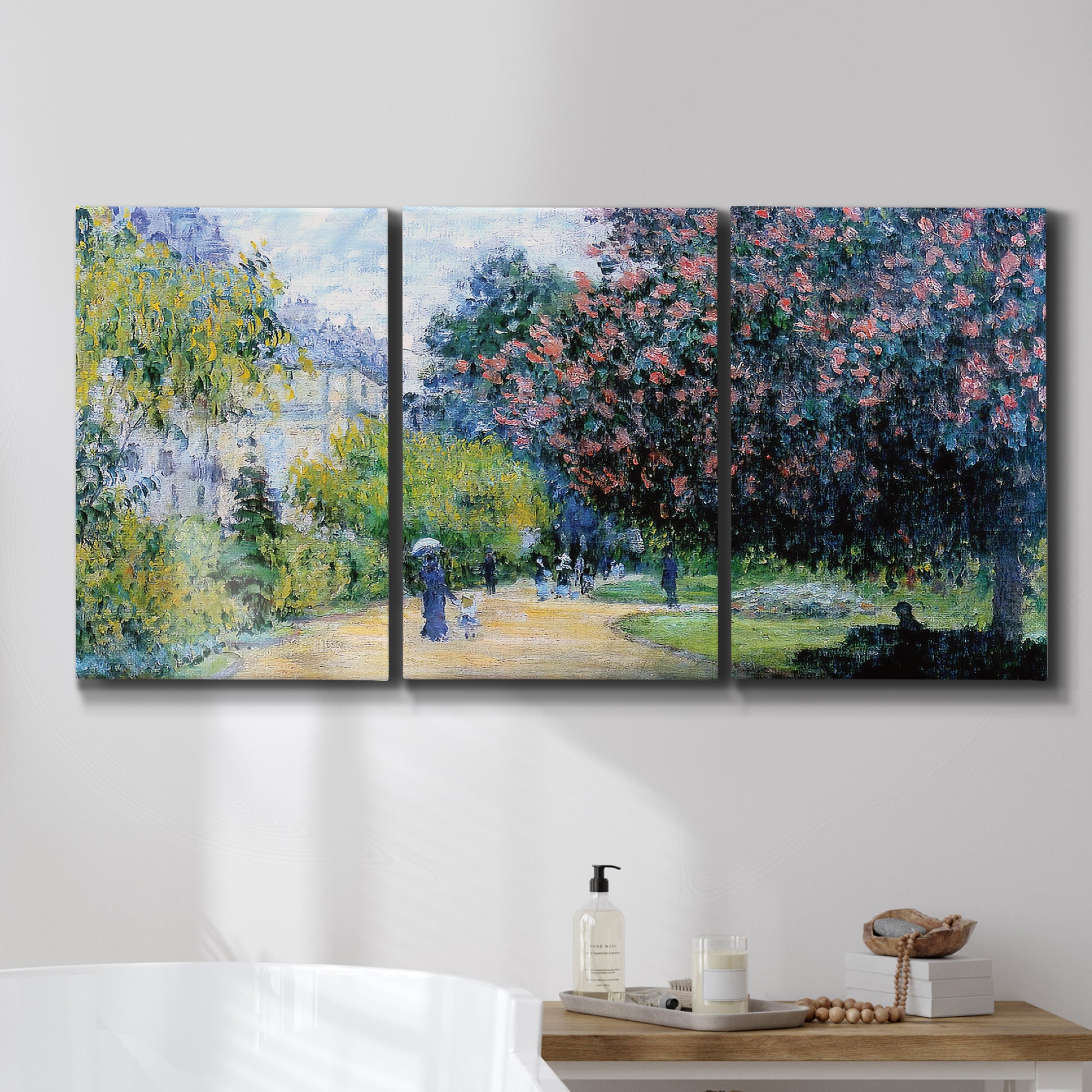 Three-panel canvas wall art featuring formal city park with trees, displayed in a bathroom above a bathtub.
