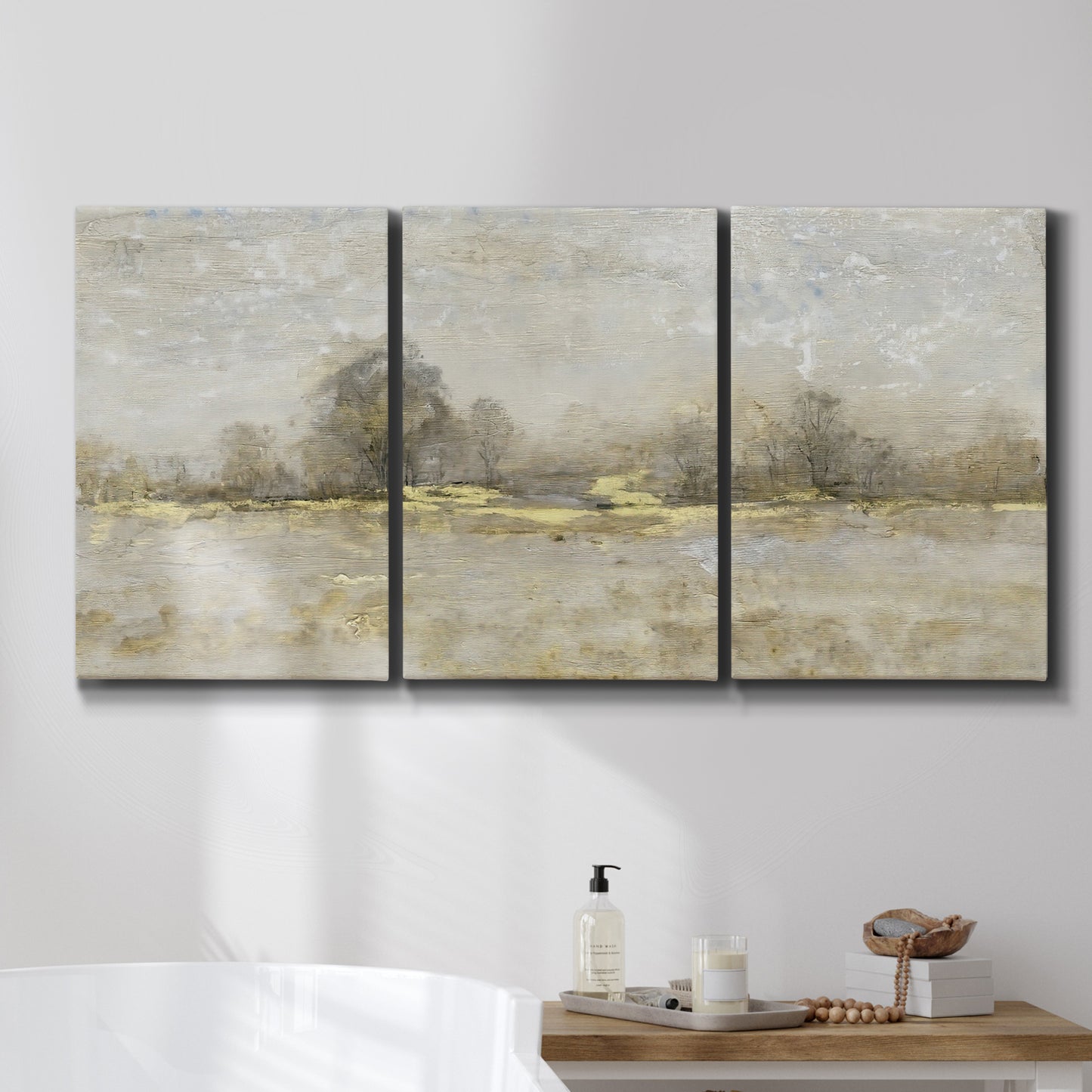 Three-panel canvas wall art featuring late season rural harvest fields, displayed in a bathroom above a bathtub.