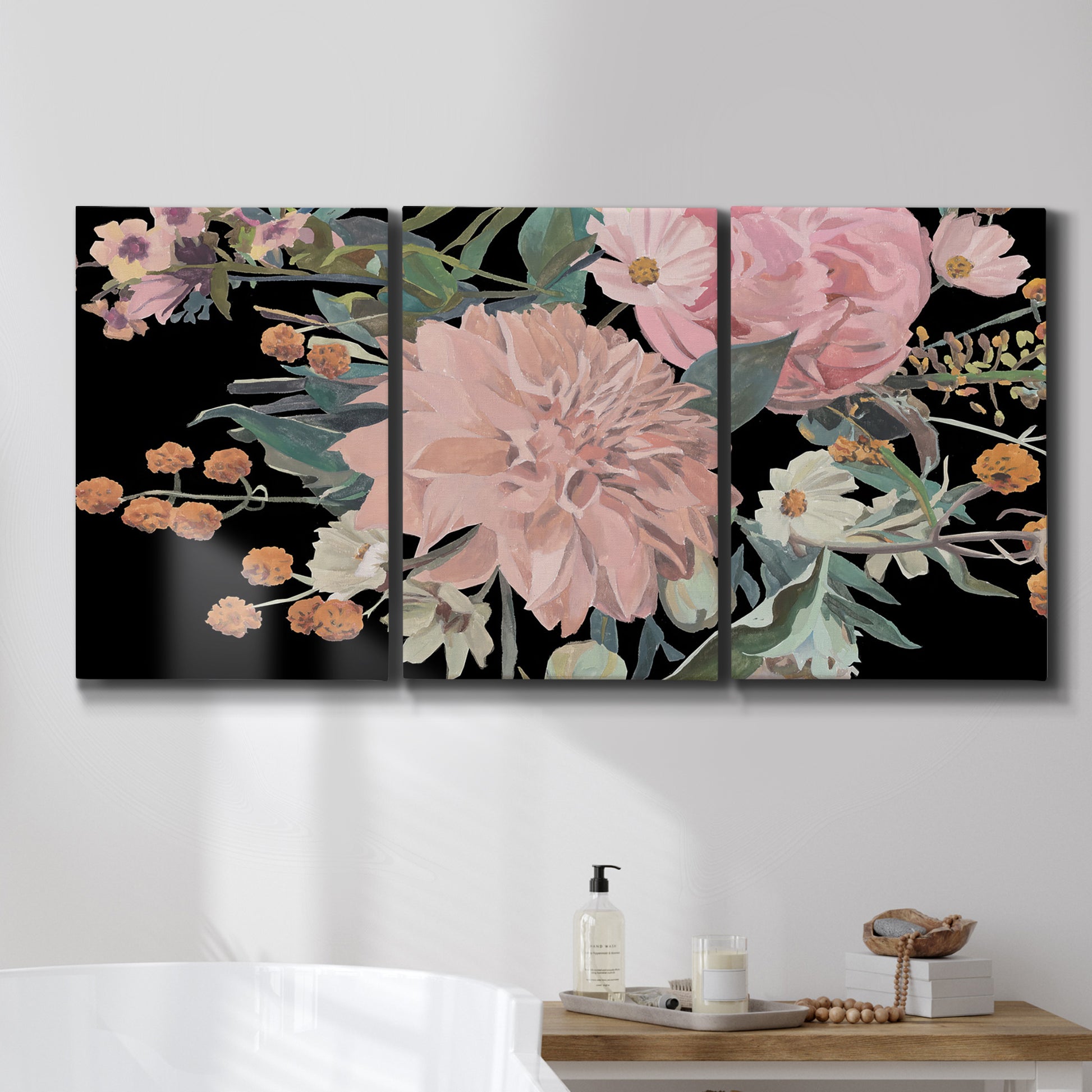 Three-panel canvas wall art featuring dark floral night blossoms, displayed in a bathroom above a bathtub.