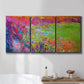 Three-panel canvas wall art featuring abstract meadow inspired color fields, displayed in a bathroom above a bathtub.