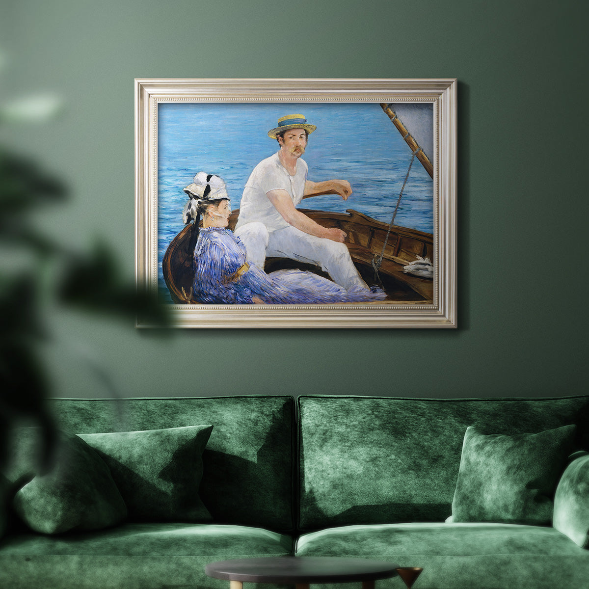 Impressionist leisure boating scene by Édouard Manet in an ornate champagne frame displayed in a dark-toned interior setting.