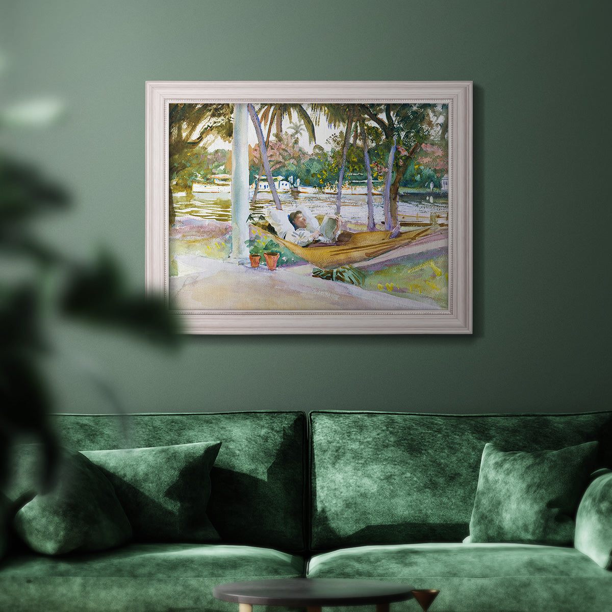 Impressionist leisure portrait scene by John Singer Sargent in an ornate weathered white frame displayed in a dark-toned interior setting.