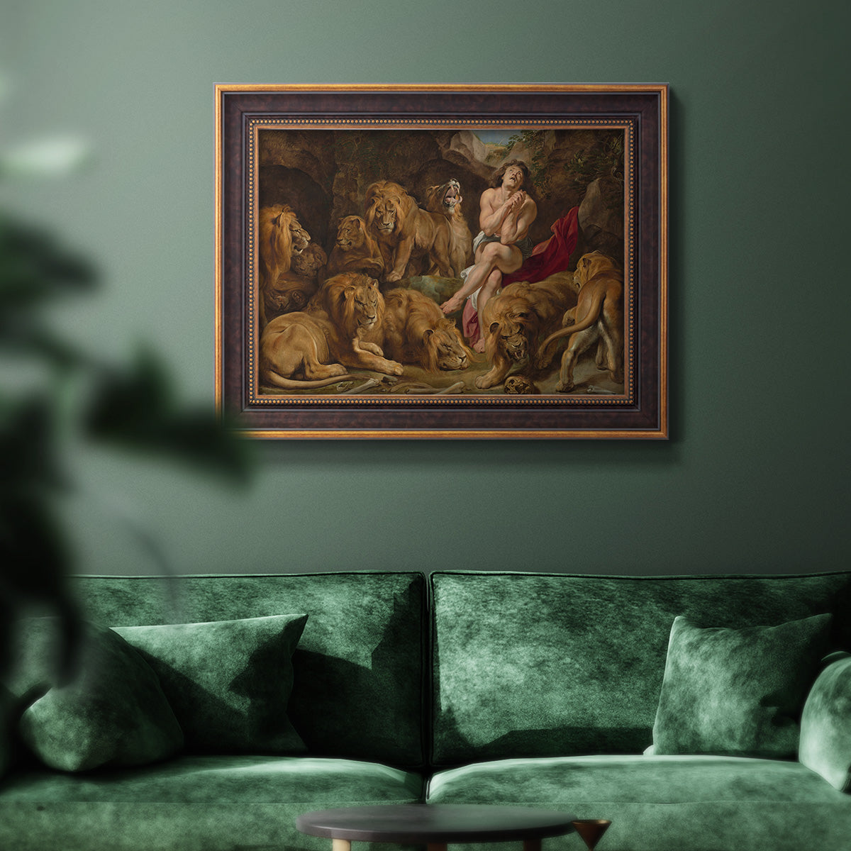 Dramatic biblical painting of Daniel with lions by Peter Paul Rubens in an ornate bronzed mahogany wood frame displayed in a dark-toned interior setting.