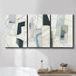 Three-panel canvas wall art featuring interwoven icy abstract linear forms, displayed in a bathroom above a bathtub.