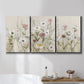 Three-panel canvas wall art featuring loose farmhouse style floral painting, displayed in a bathroom above a bathtub.