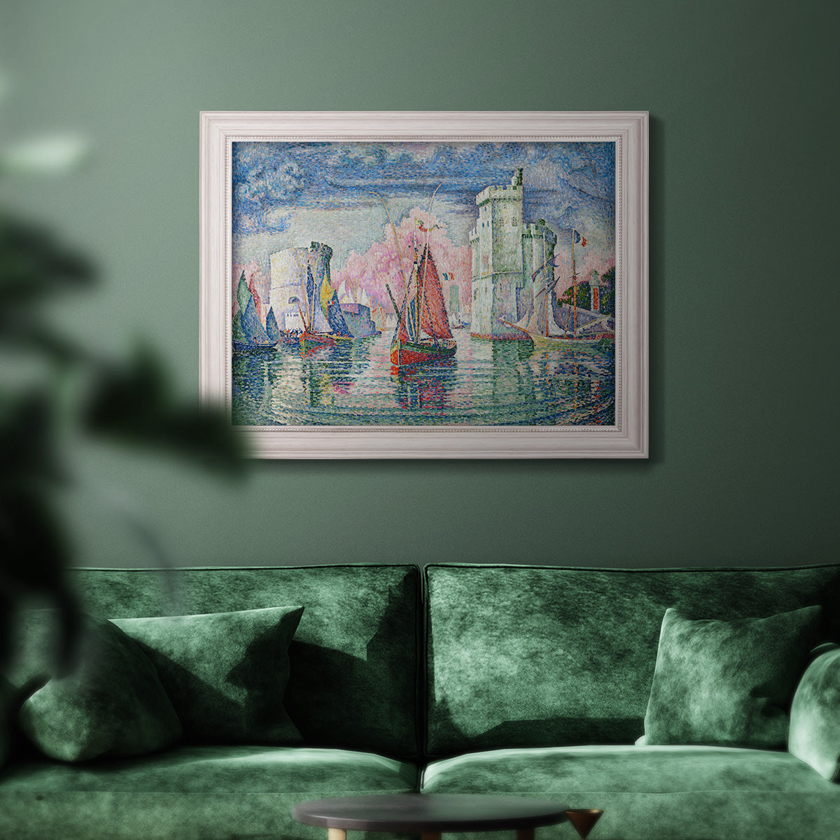 Impressionist harbor scene by Paul Signac in an ornate weathered white frame displayed in a dark-toned interior setting.