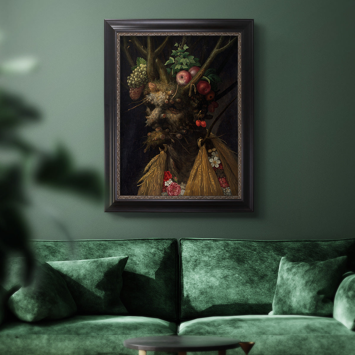 Surreal allegorical portrait representing the four seasons by Giuseppe Arcimboldo in an ornate black frame with gilded inner detail displayed in a dark-toned interior setting.