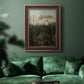 Dreamlike forest landscape scene by Henri Rousseau in an ornate bronzed mahogany wood frame displayed in a dark-toned interior setting.