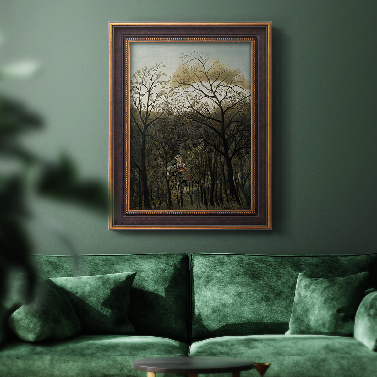Dreamlike forest landscape scene by Henri Rousseau in an ornate bronzed mahogany wood frame displayed in a dark-toned interior setting.