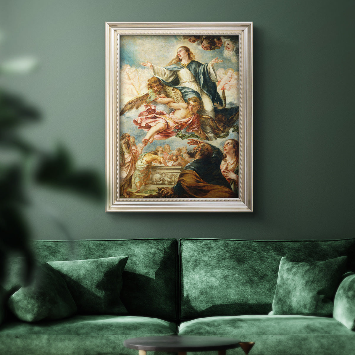 Religious painting of the Assumption of the Virgin Mary by Juan de Valdés Leal in an ornate champagne frame displayed in a dark-toned interior setting.