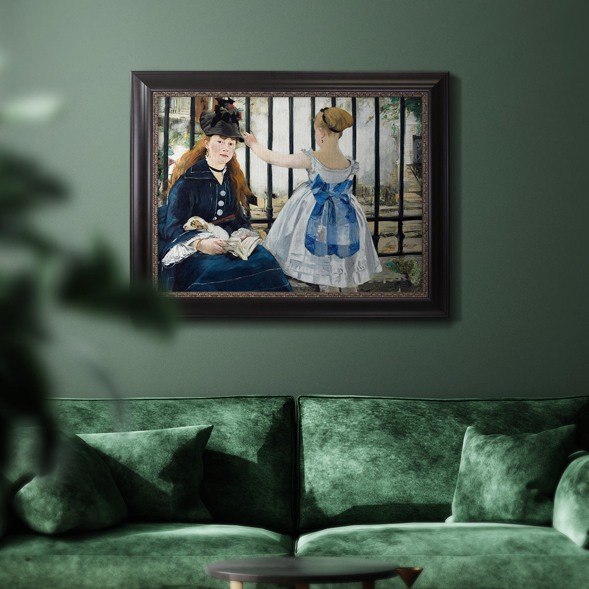 Impressionist urban scene near a railway by Édouard Manet in an ornate black frame with gilded inner detail displayed in a dark-toned interior setting.