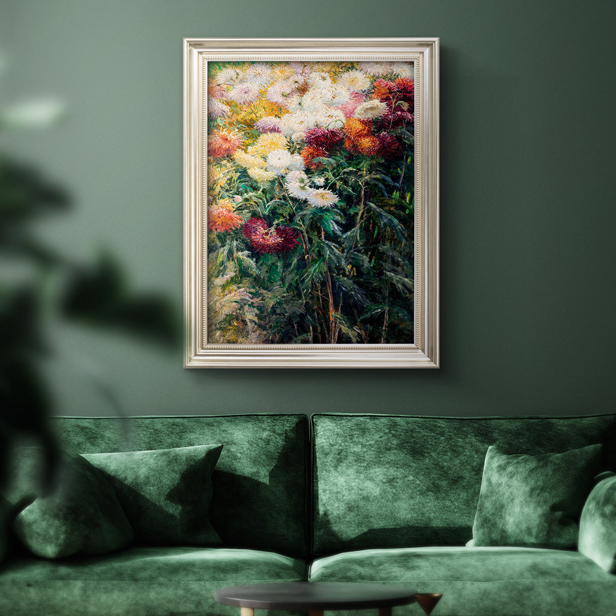 Impressionist garden floral painting by Gustave Caillebotte in an ornate champagne frame displayed in a dark-toned interior setting.