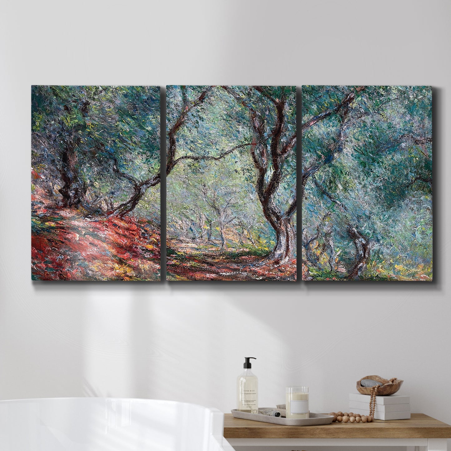 Three-panel canvas wall art featuring olive trees in sunlit garden, displayed in a bathroom above a bathtub.