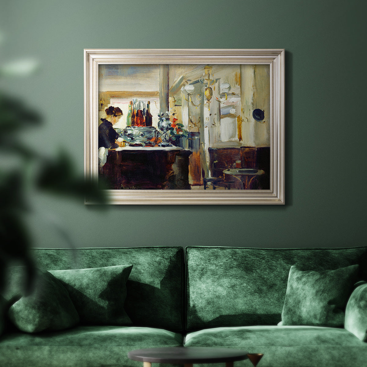 Impressionist café still life scene by Édouard Manet in an ornate champagne frame displayed in a dark-toned interior setting.