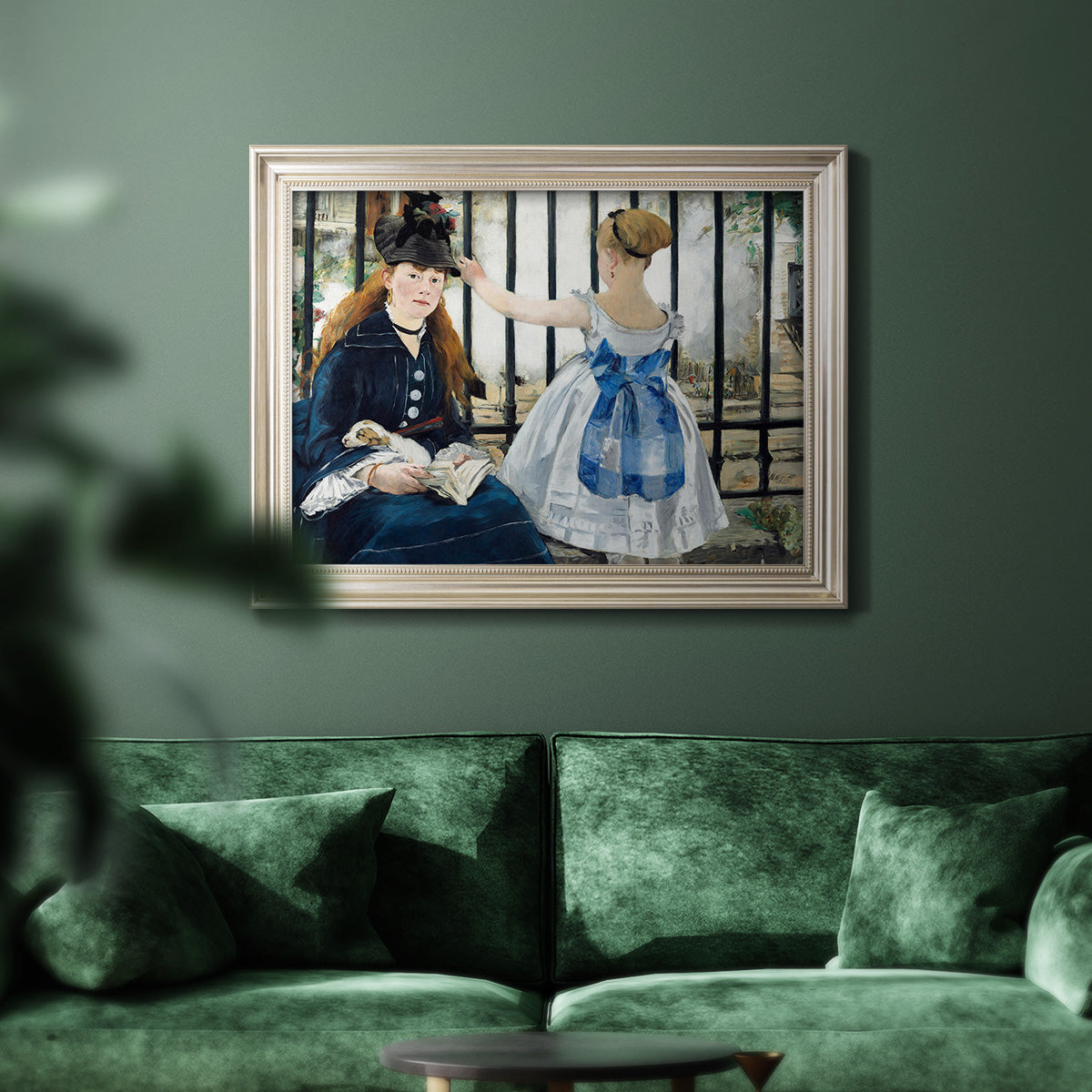 Impressionist urban scene near a railway by Édouard Manet in an ornate champagne frame displayed in a dark-toned interior setting.