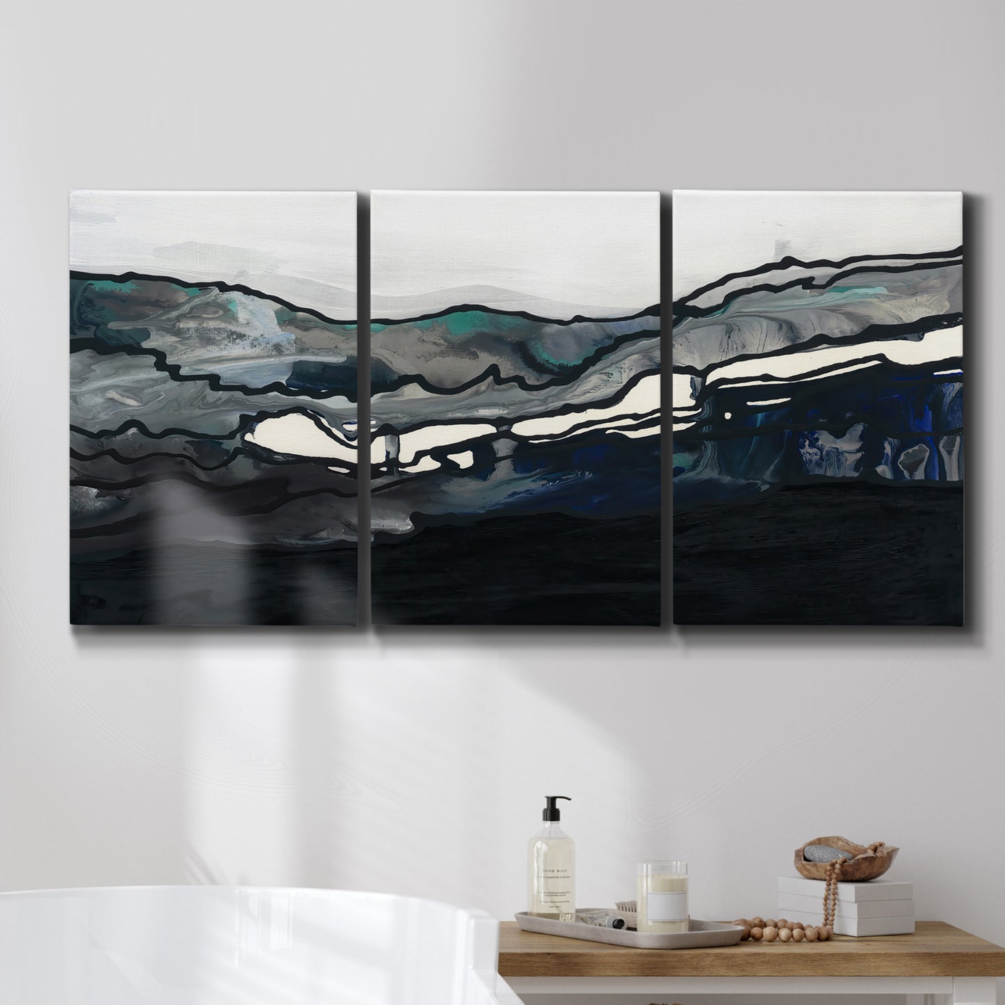 Three-panel canvas wall art featuring abstract passage of time composition, displayed in a bathroom above a bathtub.