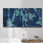 Three-panel canvas wall art featuring abstract floral shapes, displayed in a bathroom above a bathtub.