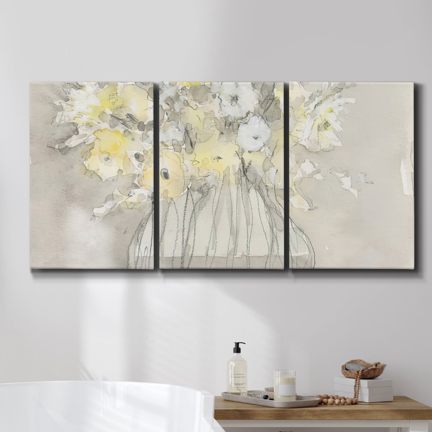 Three-panel canvas wall art featuring vintage floral abstract composition, displayed in a bathroom above a bathtub.