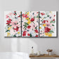 Three-panel canvas wall art featuring joyful spring floral composition, displayed in a bathroom above a bathtub.