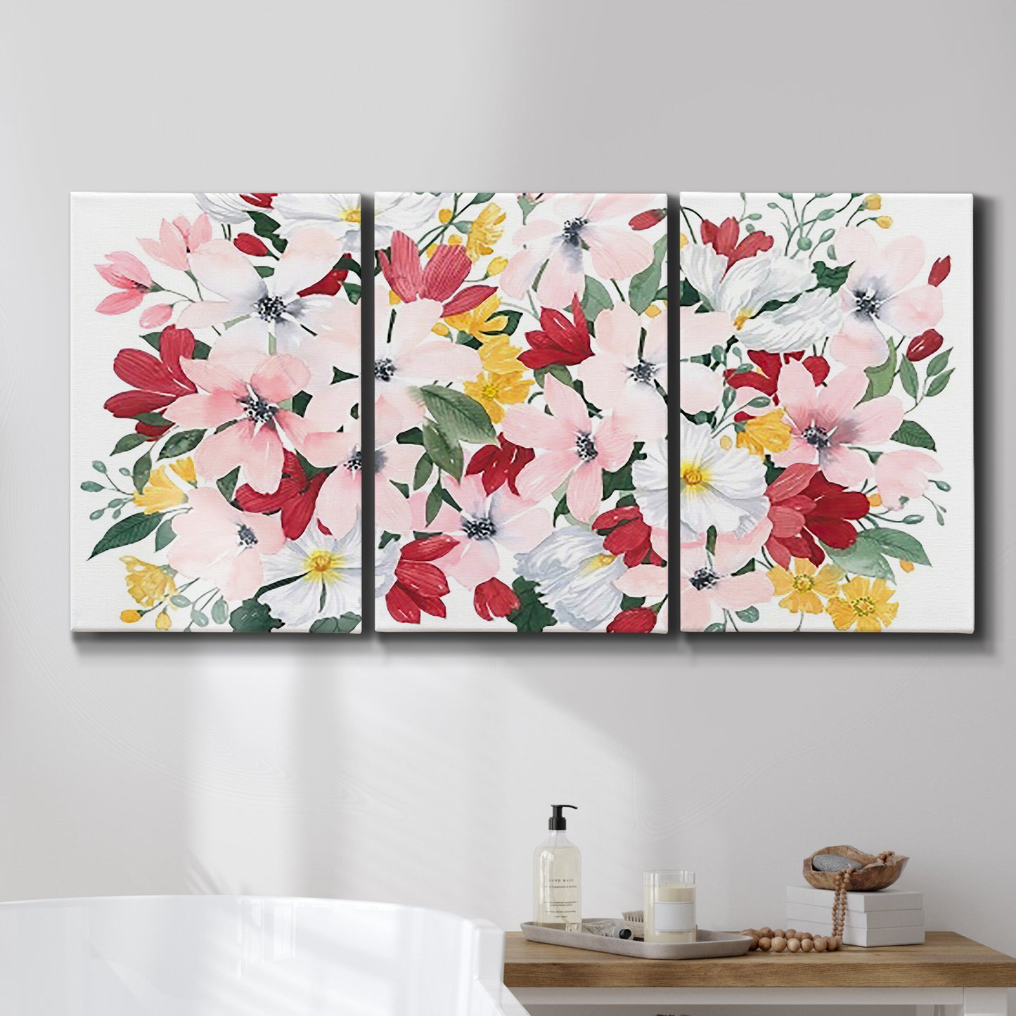 Three-panel canvas wall art featuring joyful spring floral composition, displayed in a bathroom above a bathtub.