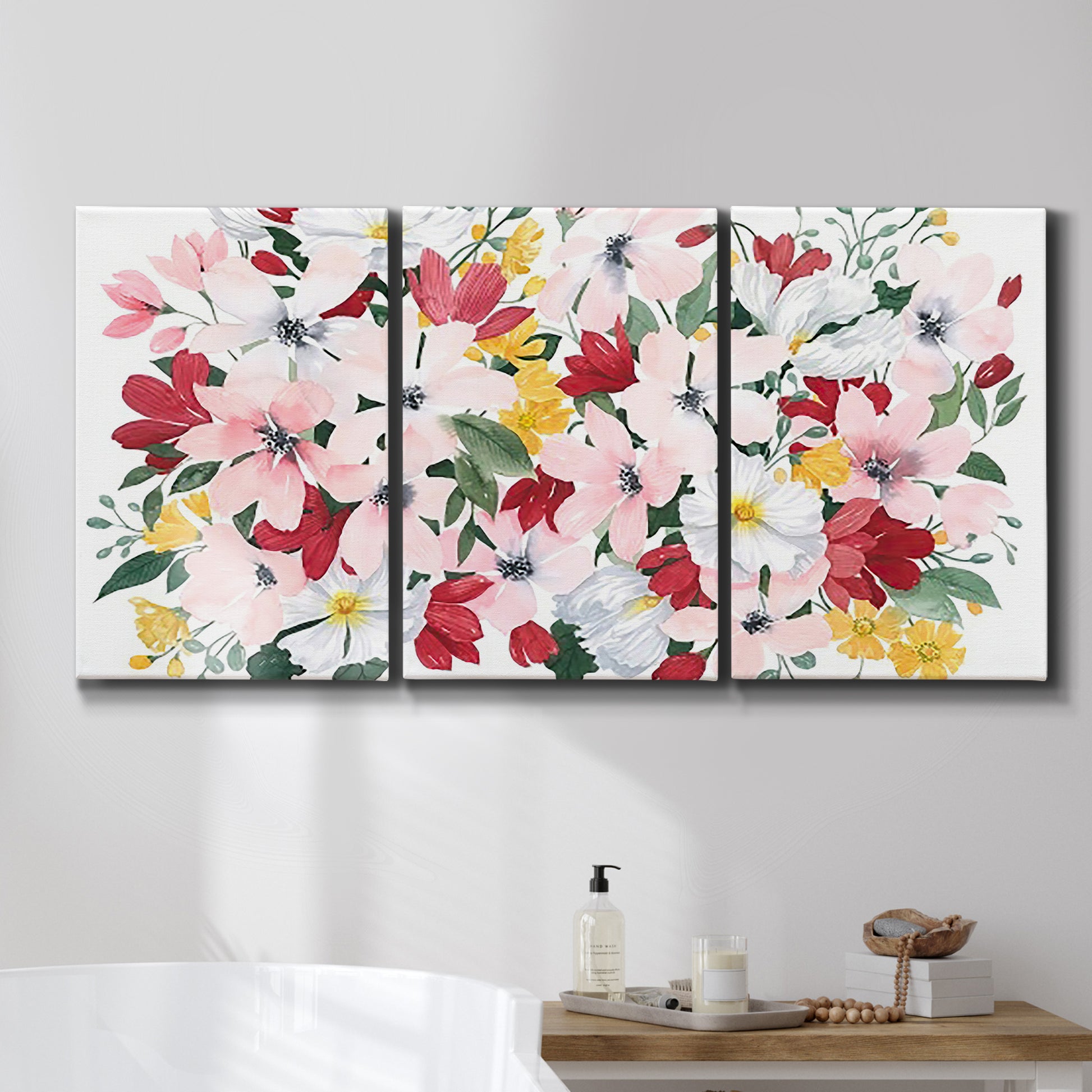Three-panel canvas wall art featuring joyful spring floral composition, displayed in a bathroom above a bathtub.