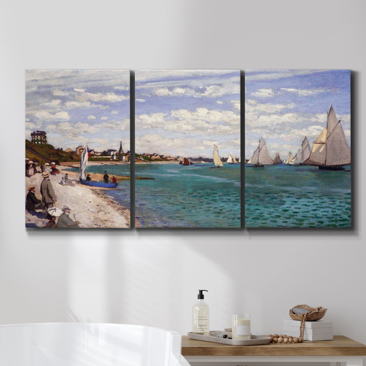 Three-panel canvas wall art featuring river basin with boats, displayed in a bathroom above a bathtub.