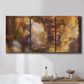 Three-panel canvas wall art featuring abstract architectural landscape, displayed in a bathroom above a bathtub.