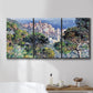 Three-panel canvas wall art featuring coastal hillside overlooking monaco, displayed in a bathroom above a bathtub.