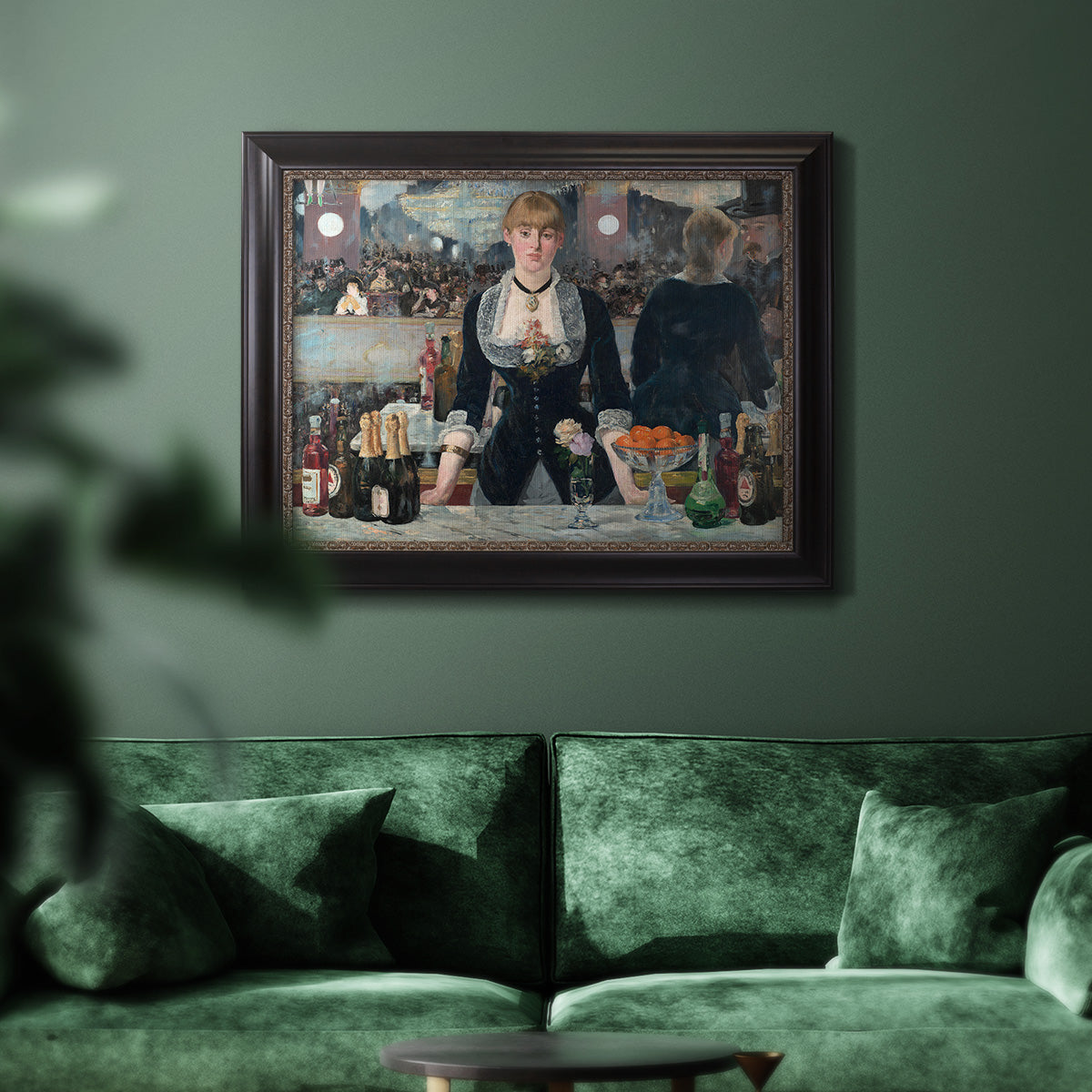 Iconic impressionist café bar scene by Édouard Manet in an ornate black frame with gilded inner detail displayed in a dark-toned interior setting.