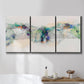 Three-panel canvas wall art featuring abstract mountain range watercolor, displayed in a bathroom above a bathtub.