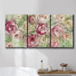 Three-panel canvas wall art featuring blooming climbing rose, displayed in a bathroom above a bathtub.
