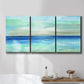 Three-panel canvas wall art featuring vast open blue ocean horizon, displayed in a bathroom above a bathtub.