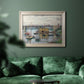 Impressionist river bridge scene on an overcast day by Claude Monet in an ornate champagne frame displayed in a dark-toned interior setting.