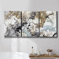 Three-panel canvas wall art featuring marbled modern abstract textures, displayed in a bathroom above a bathtub.