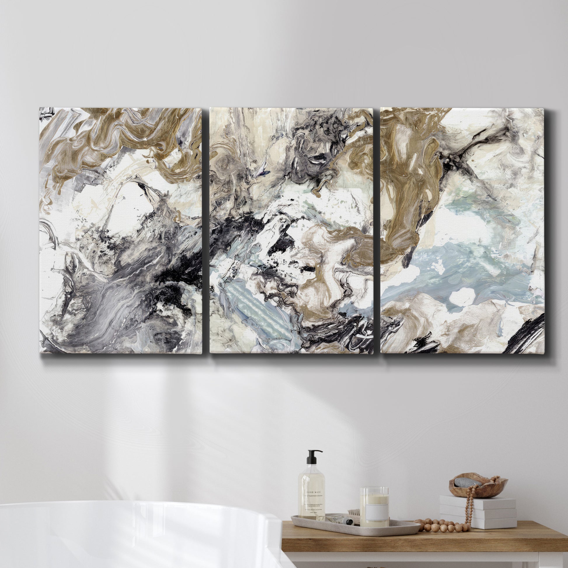 Three-panel canvas wall art featuring marbled modern abstract textures, displayed in a bathroom above a bathtub.