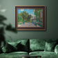 Impressionist residential landscape at Argenteuil by Claude Monet in an ornate bronzed mahogany wood frame displayed in a dark-toned interior setting.