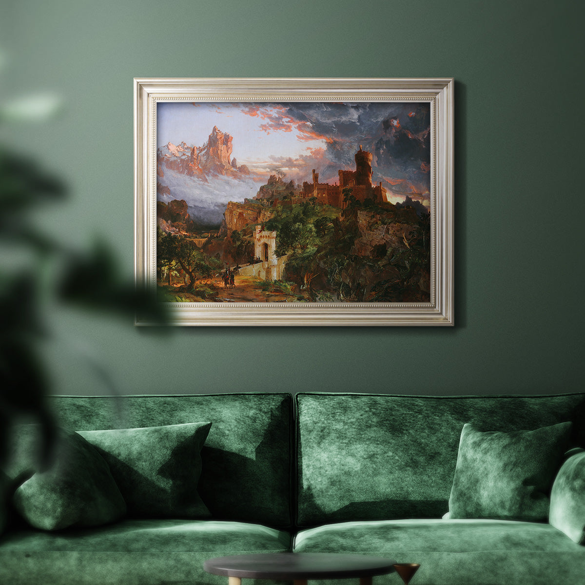 Romantic allegorical landscape painting by Jasper Francis Cropsey in an ornate champagne frame displayed in a dark-toned interior setting.