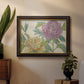 Contemporary peony flower illustration in an ornate mahogany wood frame with gold liner displayed in a dark-toned interior setting.