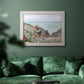 Impressionist coastal watch cabin scene by Claude Monet in an ornate weathered white frame displayed in a dark-toned interior setting.