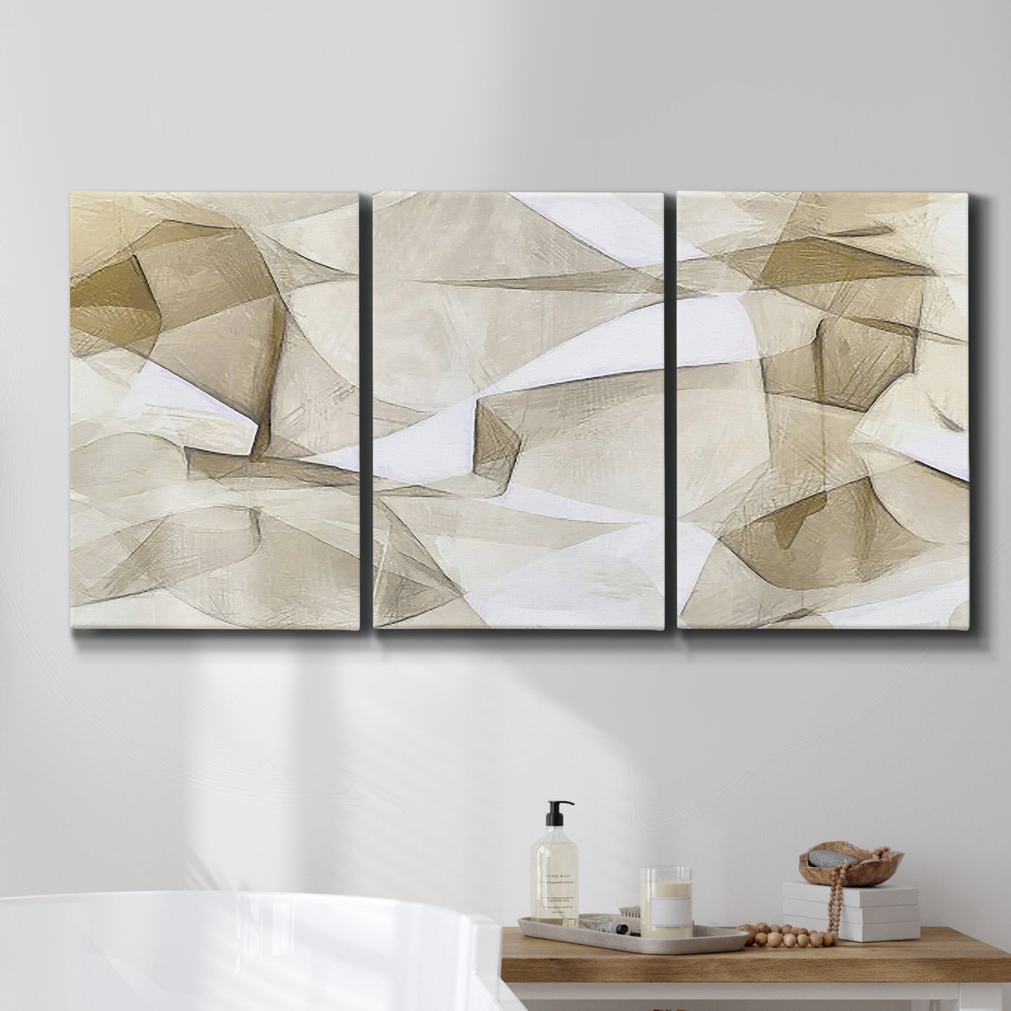 Three-panel canvas wall art featuring soft abstract meditative color balance, displayed in a bathroom above a bathtub.