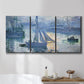 Three-panel canvas wall art featuring sailboats racing on river, displayed in a bathroom above a bathtub.
