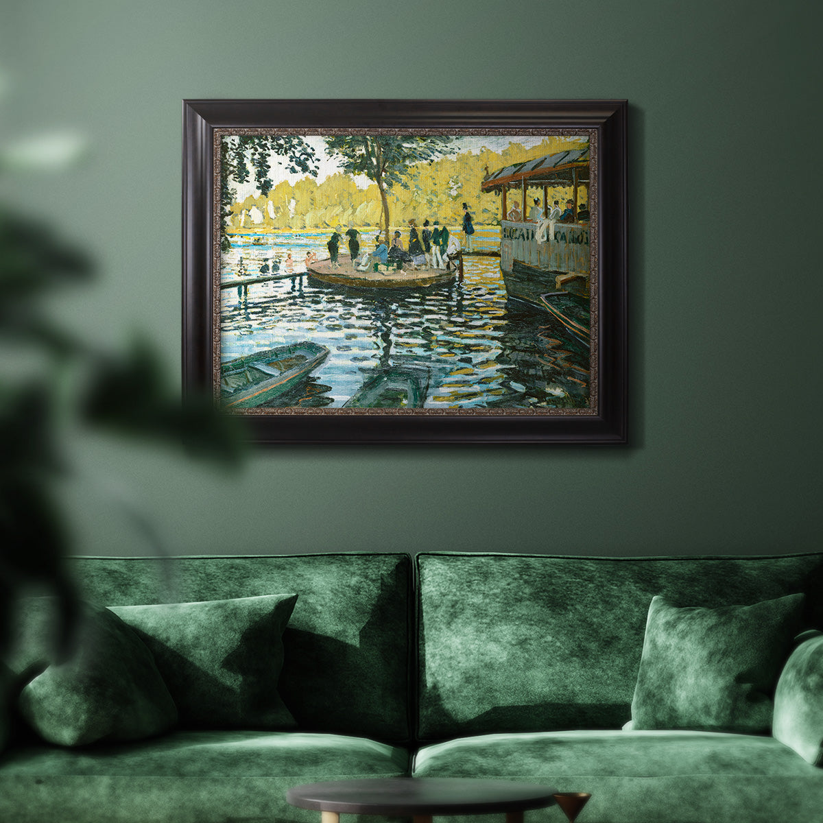 Impressionist riverside leisure scene by Claude Monet in an ornate black frame with gilded inner detail displayed in a dark-toned interior setting.